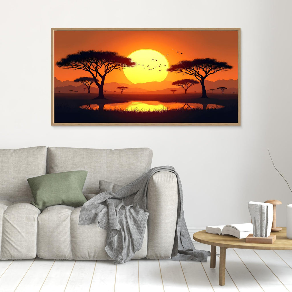 Acacia Trees canvas wall art depicting silhouetted trees at sunset in warm orange and yellow tones with a peaceful water reflection