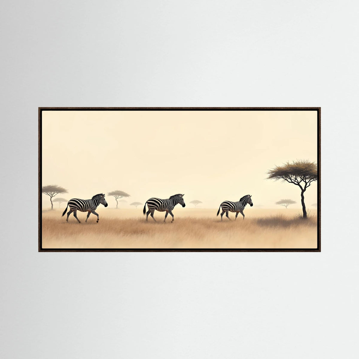 Desert Zebra Landscape canvas art featuring three black and white zebras walking on dry grass with sparse acacia trees and a muted beige sky