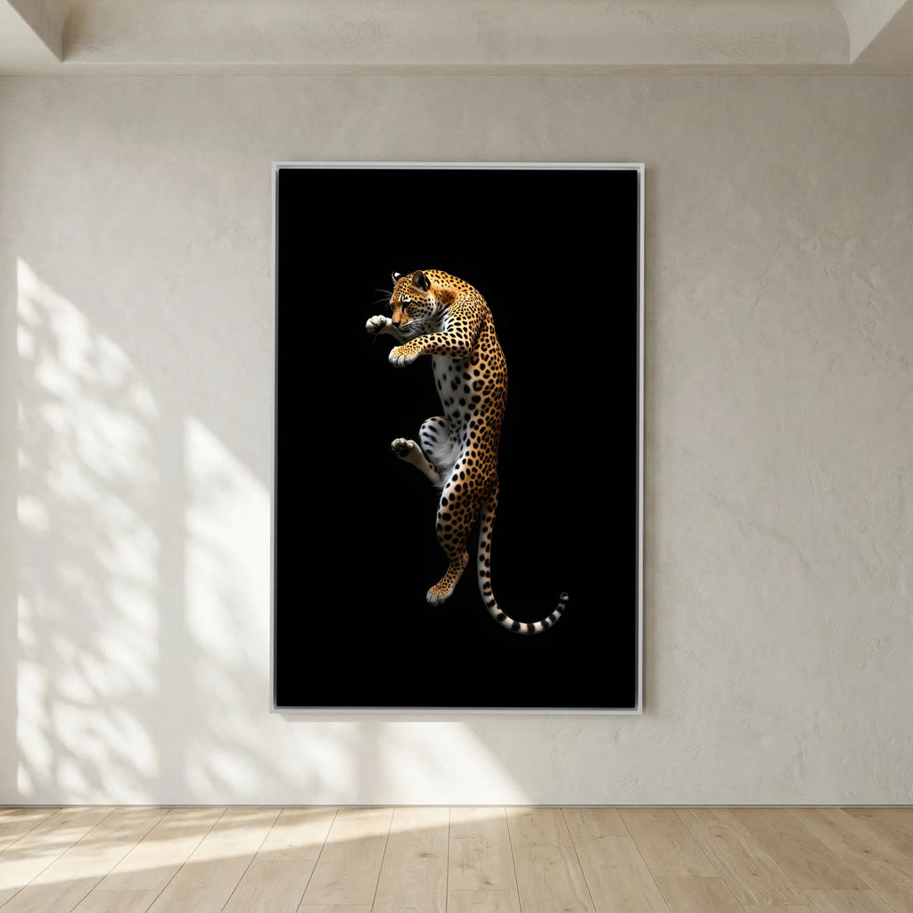 Leopard Golden Canvas wall art featuring a detailed jumping leopard against a plain black background in a sleek black frame