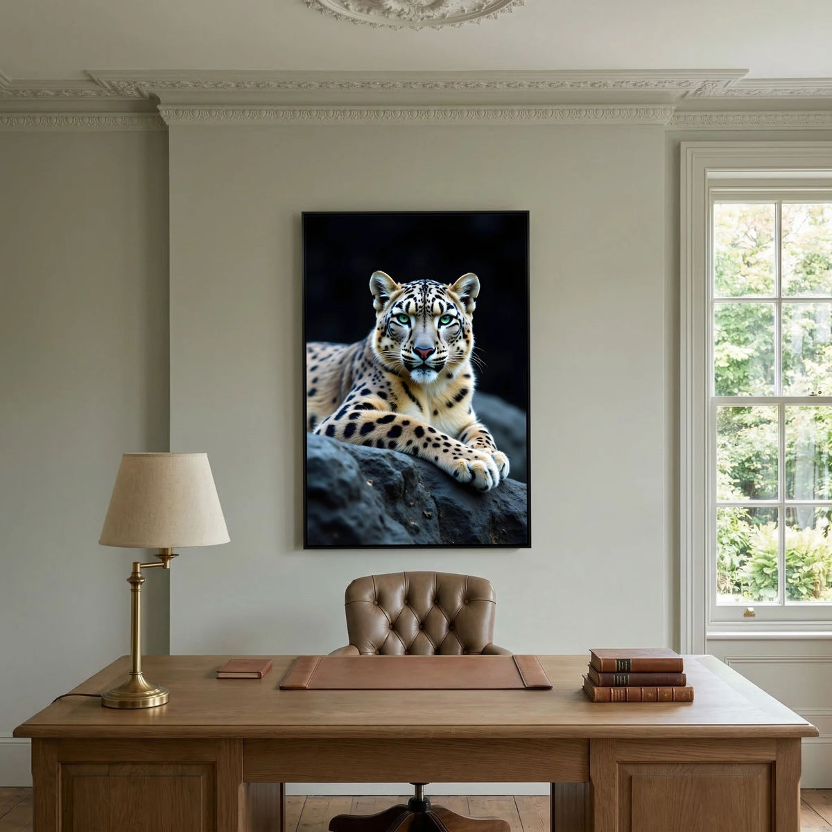 Snow Leopard Big Cat Canvas featuring a close-up of a snow leopard resting on rocks with vivid green eyes and detailed fur
