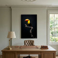 Toucan Statement Piece canvas wall art featuring a vibrant toucan with black background, displayed above a wooden office desk